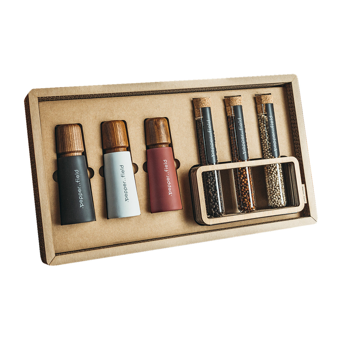 Luxury gift case made of recycled cardboard with 3 grinders and Kampot pepper 3x70g in tubes with a stand